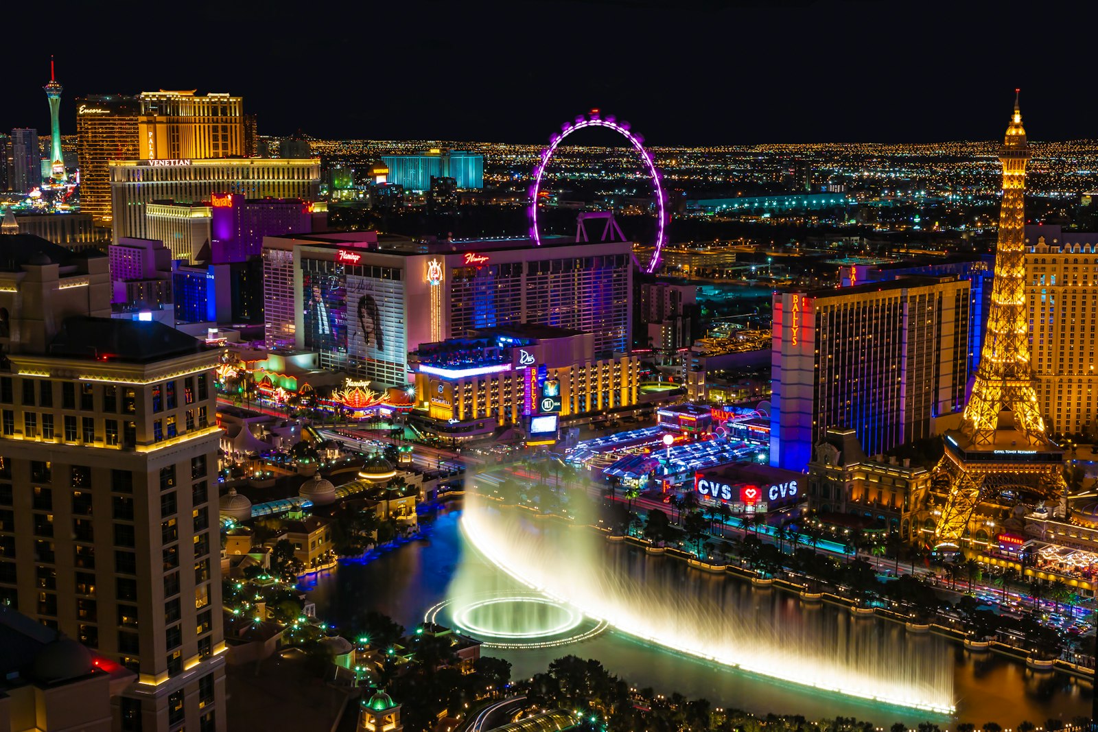 Las Vegas Strip at night lit by bright neon signs and casino marquees